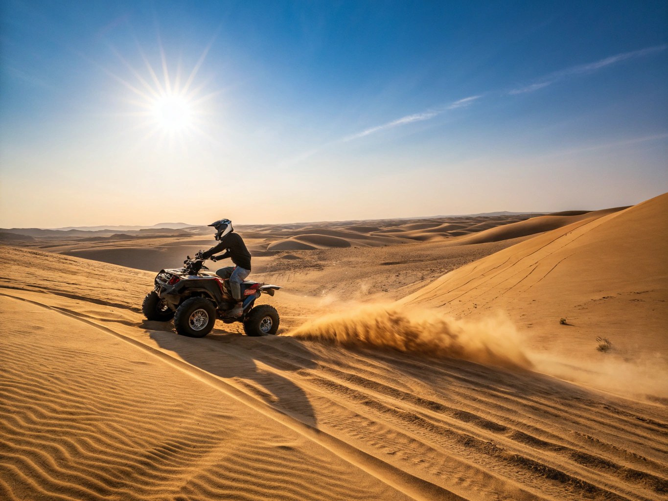 Desert safari quad biking across golden sand dunes in Hurghada at sunset