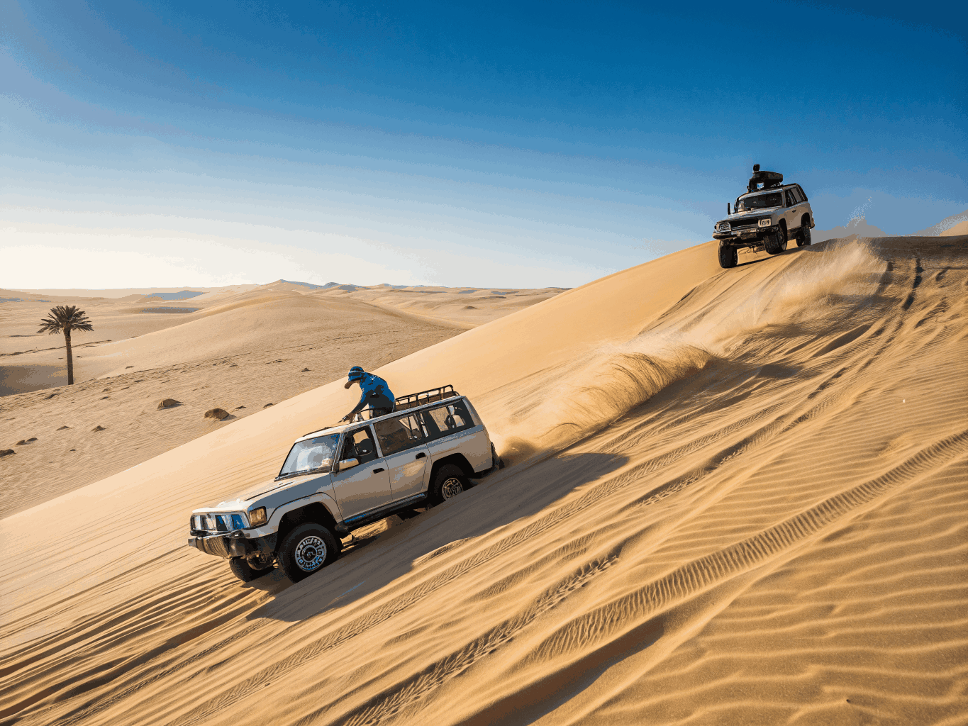 Off-road desert dune buggy driving over sand trails